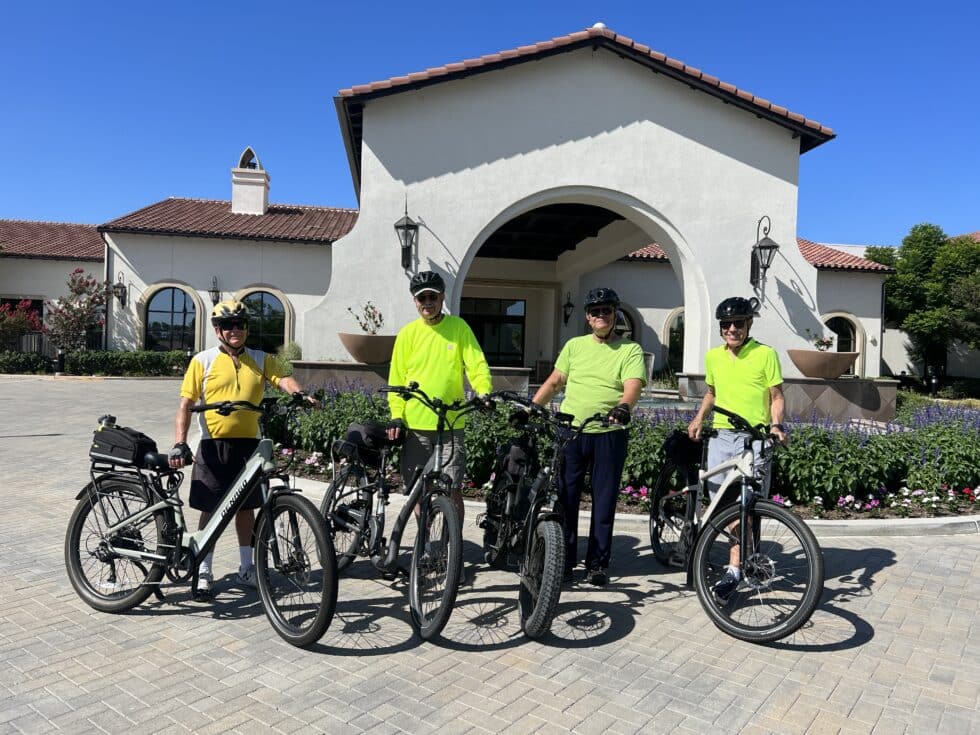REATA-YellowJackets33-980x735 The Yellow Jacket biking group stands outside of Reata Glen